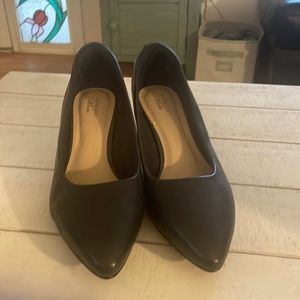 Clarks navy blue pumps. Size 8 but large 8. Never worn.